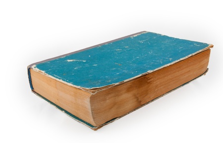 old book with yellowed pages on a white backgroundの写真素材