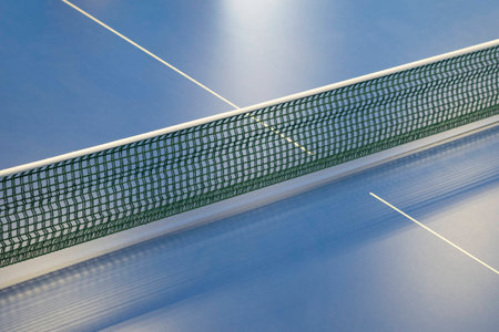 green net for pingpong and blue tennis tableの写真素材