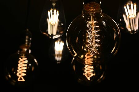 Beautiful retro luxury interior bulb lighting lamp decor glowing in dark.