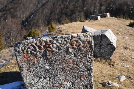 Medieval tombstones with beautiful blue sky in necropolis near Sarajevo in Bosnia and Herzegovina on...