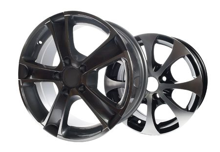 steel alloy car rims on a white background 