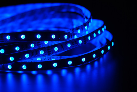 blue led stripe on the black backgroundの写真素材