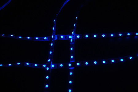 blue led stripe on the black backgroundの写真素材