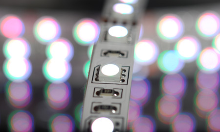 LED stripe on a background of lightsの写真素材