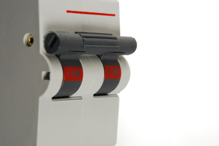 The electric switch in position ?on? on a white backgroundの写真素材