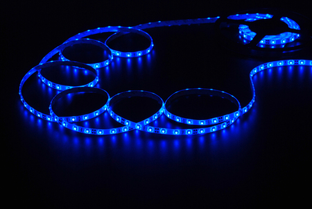 Blue led strip on the black backgroundの写真素材