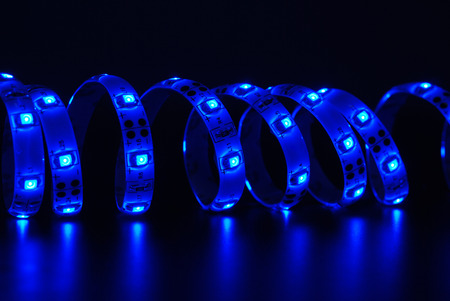 Blue led strip on the black backgroundの写真素材