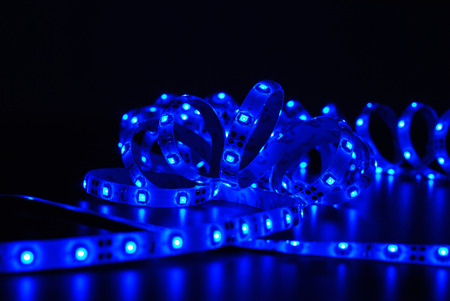 Blue led strip on the black background