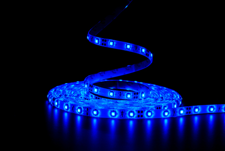 Blue led strip on the black backgroundの写真素材