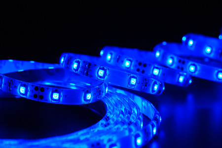 Blue led strip on the black backgroundの写真素材