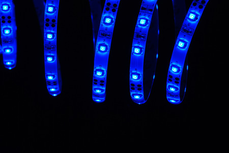 Blue led strip on the black backgroundの写真素材