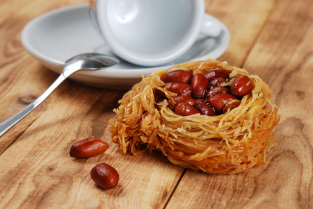 Eastern sweetness of peanuts on a wooden backgroundの写真素材