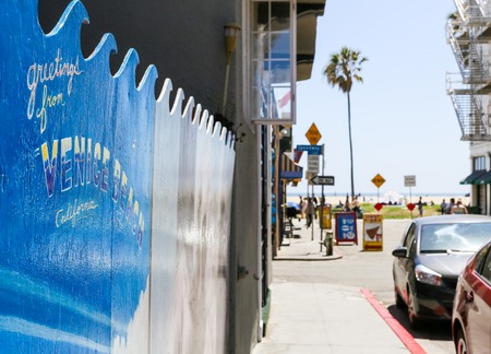 A painting saying Greetings from Venice Beach California.のeditorial素材