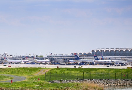 Aircrafts of American Airlines and US Airways in the movement area of Ronald Reagan National Airport in Washington DC.のeditorial素材