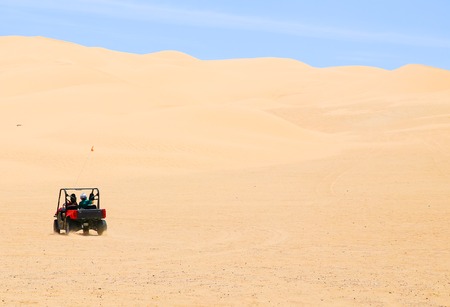 Winterhaven, California, USA - May 26, 2015: Two people driving around in the Algodones Dunes with a buggy.のeditorial素材