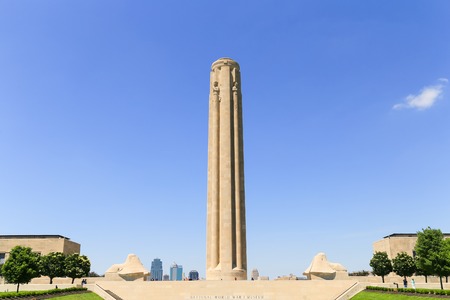 Kansas City, USA - May 21, 2016: The National World War I Museum and Memorial with part of the skyline in the back and a few visitors around.のeditorial素材