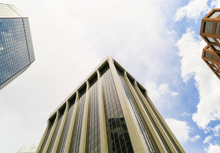 Denver, USA - May 25, 2016: Looking up a skyscraper belonging to the World Trade Center and the Colorado State Bank and Trust building in the financial and business district in downtown.のeditorial素材