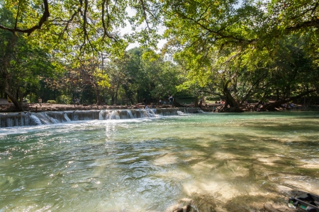 Water fall in spring season located in deep rain forest jungleの写真素材