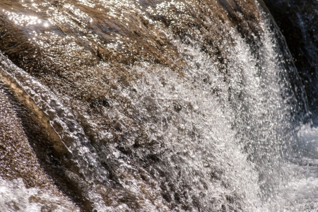 Water fall in spring season located in deep rain forest jungleの写真素材
