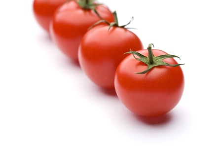 Ripe red tomato of the white backの写真素材