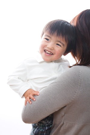 The child who was embraced by a momの写真素材