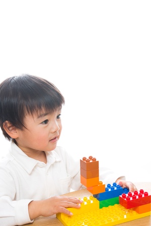 The child who plays in Legoの写真素材