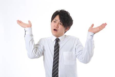 The young businessman who is surprisedの写真素材