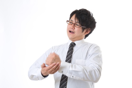 The young businessman who hitsの写真素材