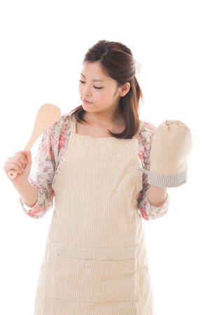 The young woman who cooksの写真素材