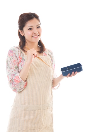 The young woman who cooks a lunchの写真素材