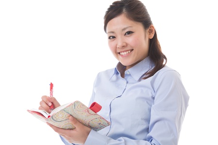 The young businesswoman who confirms a scheduleの写真素材