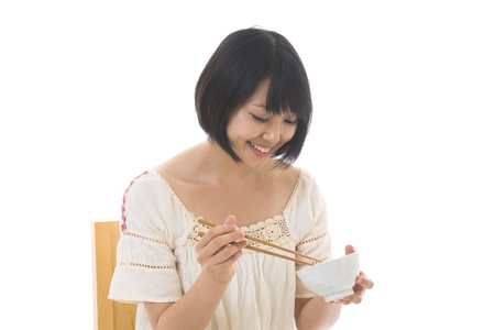The young woman who eatsの写真素材