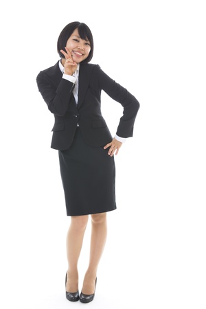 Whole body of a young businesswomanの写真素材