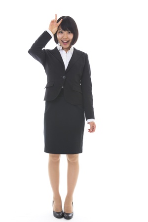 Whole body of a young businesswomanの写真素材
