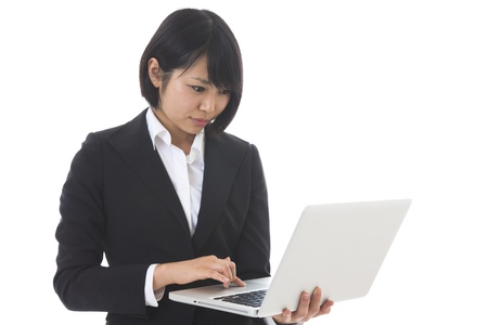 Young businesswoman to see a computerの写真素材
