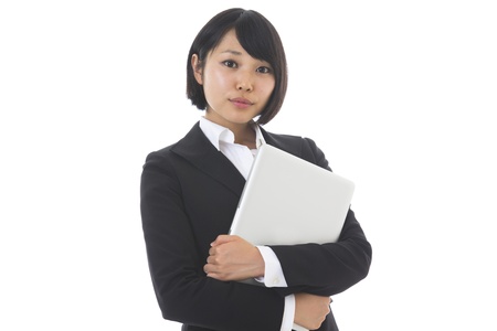 Young businesswoman to see a computerの写真素材