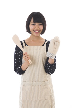 The young woman who cooksの写真素材