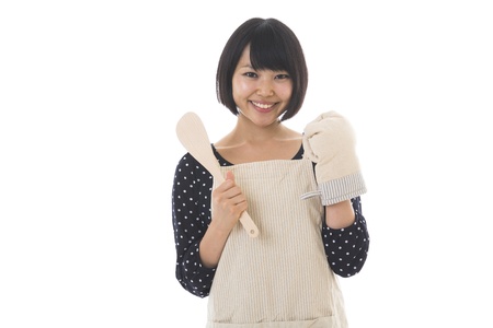 The young woman who cooksの写真素材