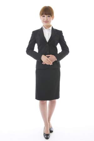 Whole body of a young businesswomanの写真素材