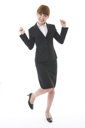 Whole body of a young businesswomanの写真素材