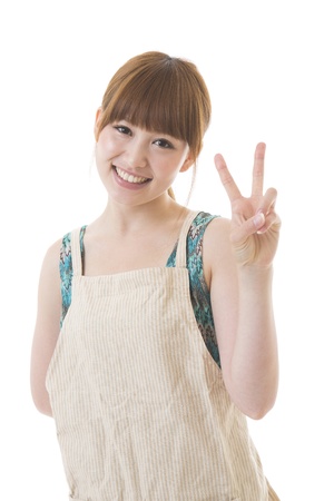 The young woman who cooksの写真素材