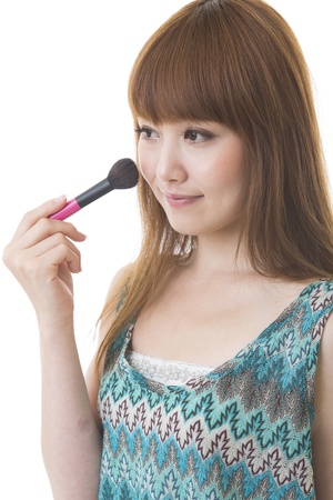 The young woman who makes upの写真素材