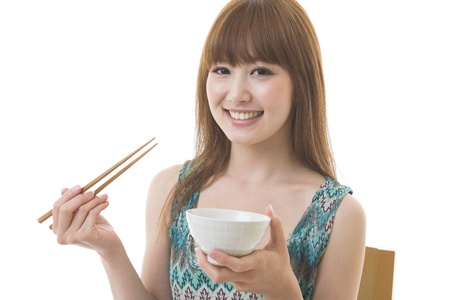 The young woman who eatsの写真素材