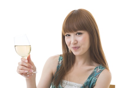 The young woman who drinks wineの写真素材