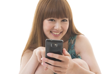 Young woman to see a smartphoneの写真素材