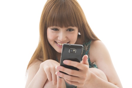 Young woman to see a smartphoneの写真素材