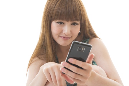 Young woman to see a smartphoneの写真素材