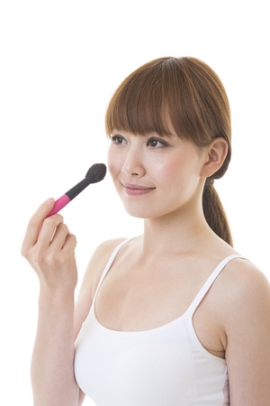 The young woman who makes upの写真素材
