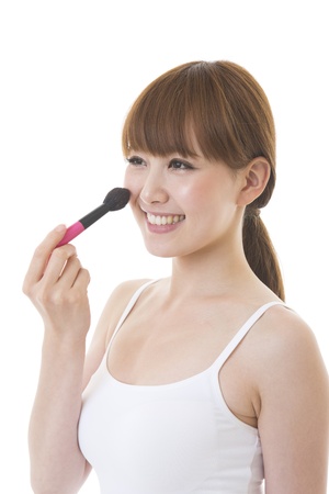 The young woman who makes upの写真素材