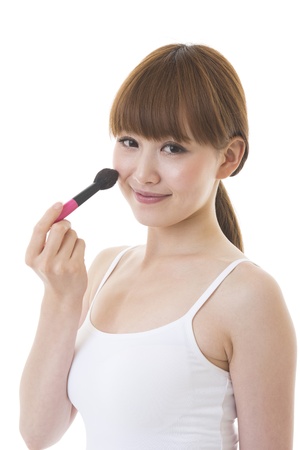 The young woman who makes upの写真素材
